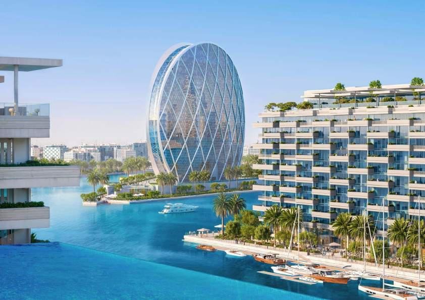 Panoramic waterfront skyline and modern residential towers at Juman At Luluat Al Raha Abu Dhabi